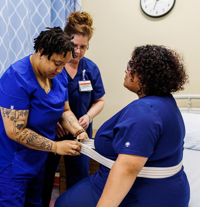 Nurse Aide students learning with instructor
