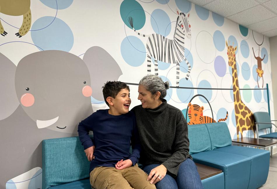 Eamon laughs with his mother